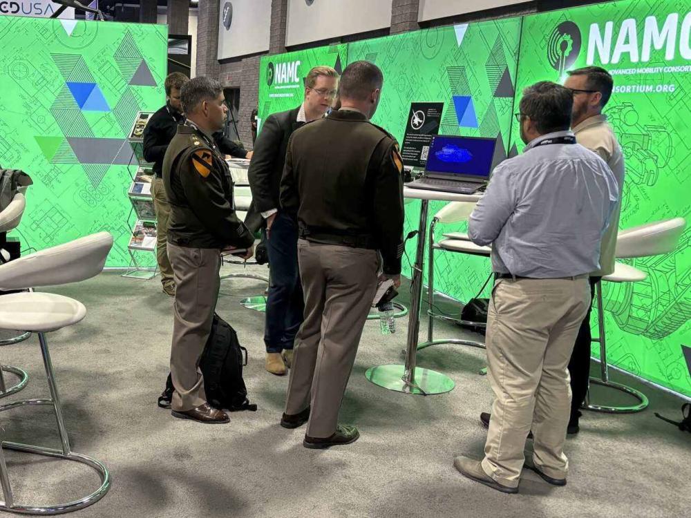 COL Kevin Bradley visits NAMC Member Co-Exhibitors AUSA 2024